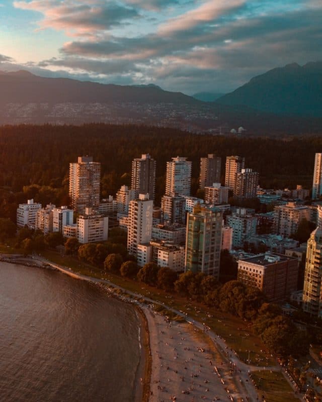 English Bay and the West End skyline at sunset from the air