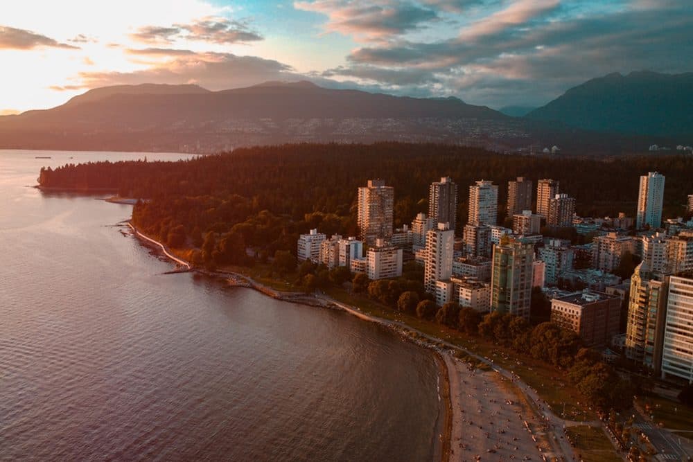 English Bay and the West End skyline at sunset from the air